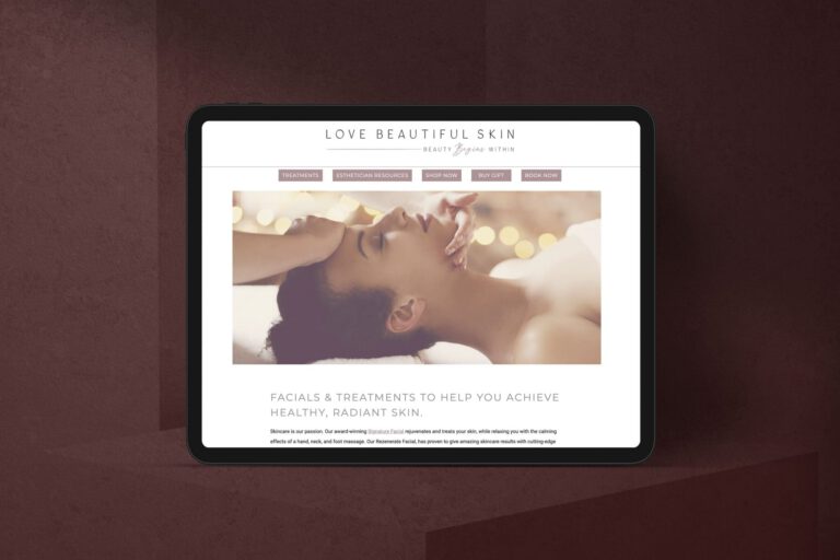 Tablet mockup showing the Love Beautiful Skin homepage with navigation and a spa facial hero image. WordPress website design and development services by A LA MODE designs.